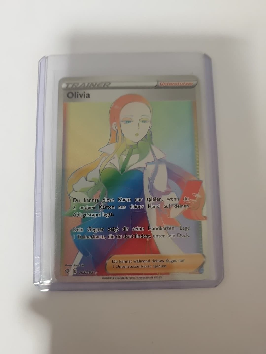Trainer Olivia 202/192 - Rainbow Rare - Pokémon Clash der Rebellen - deutsch EX