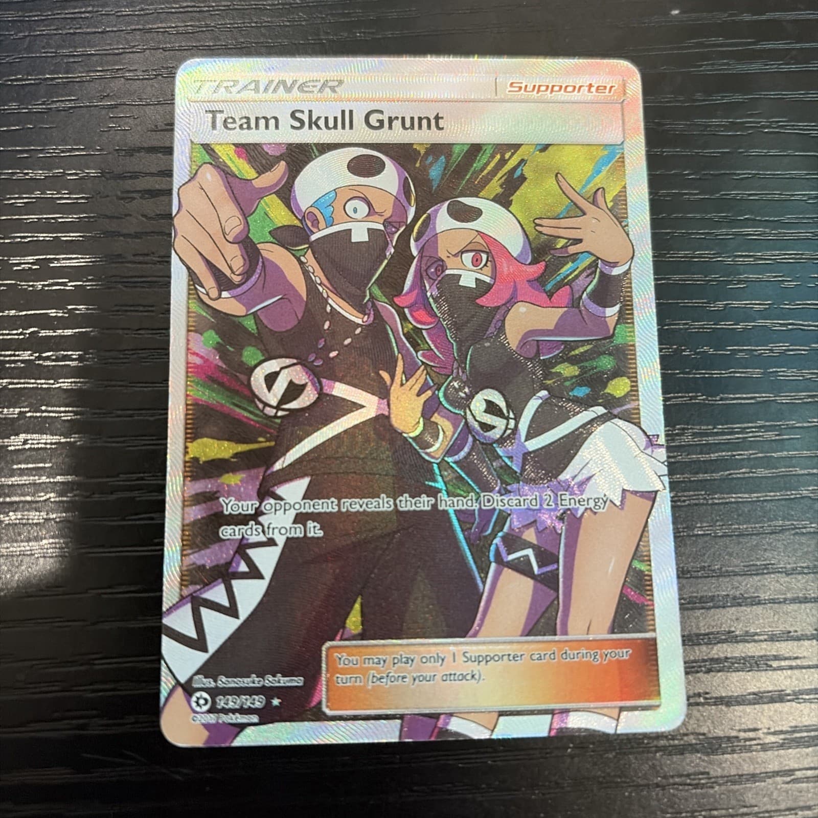 Team Skull Grunt (Full Art) 149/149 Sun & moon Base Set Holo