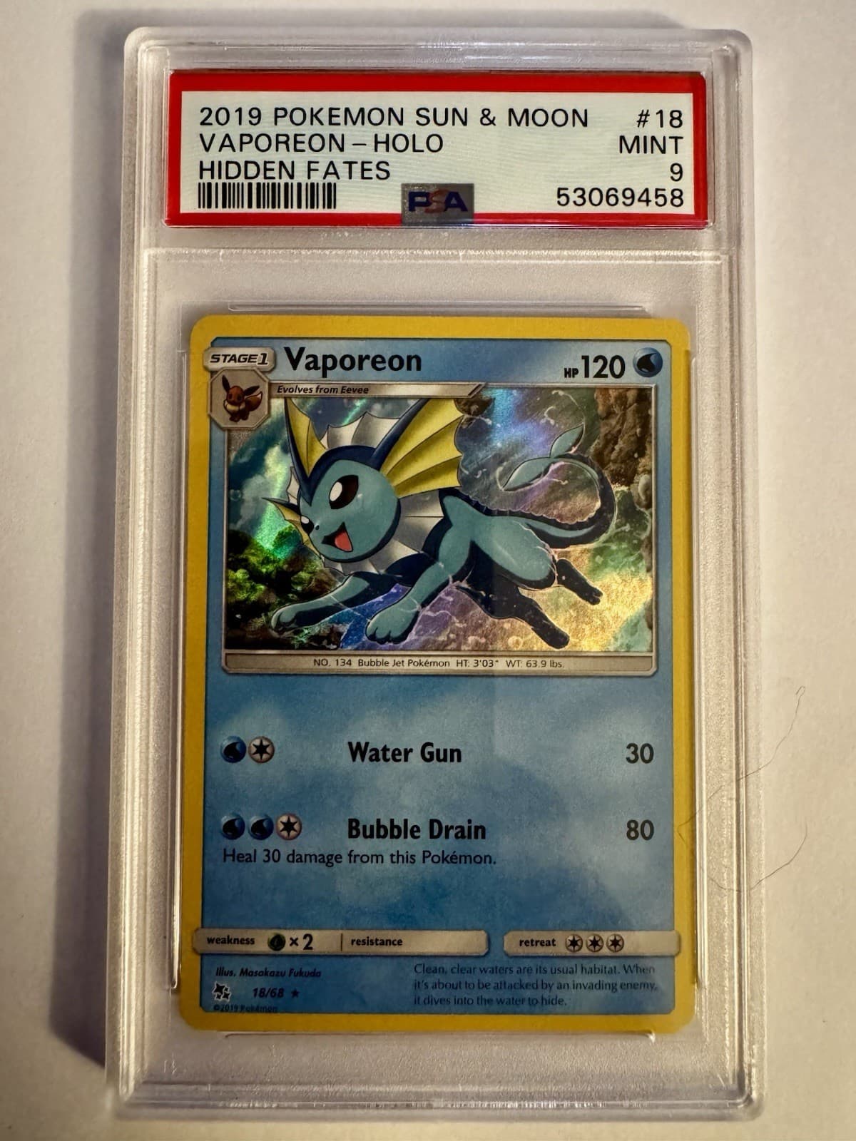 2019 Pokemon Sun & Moon Vaporeon Holo Hidden Fates #18 PSA 9 MINT