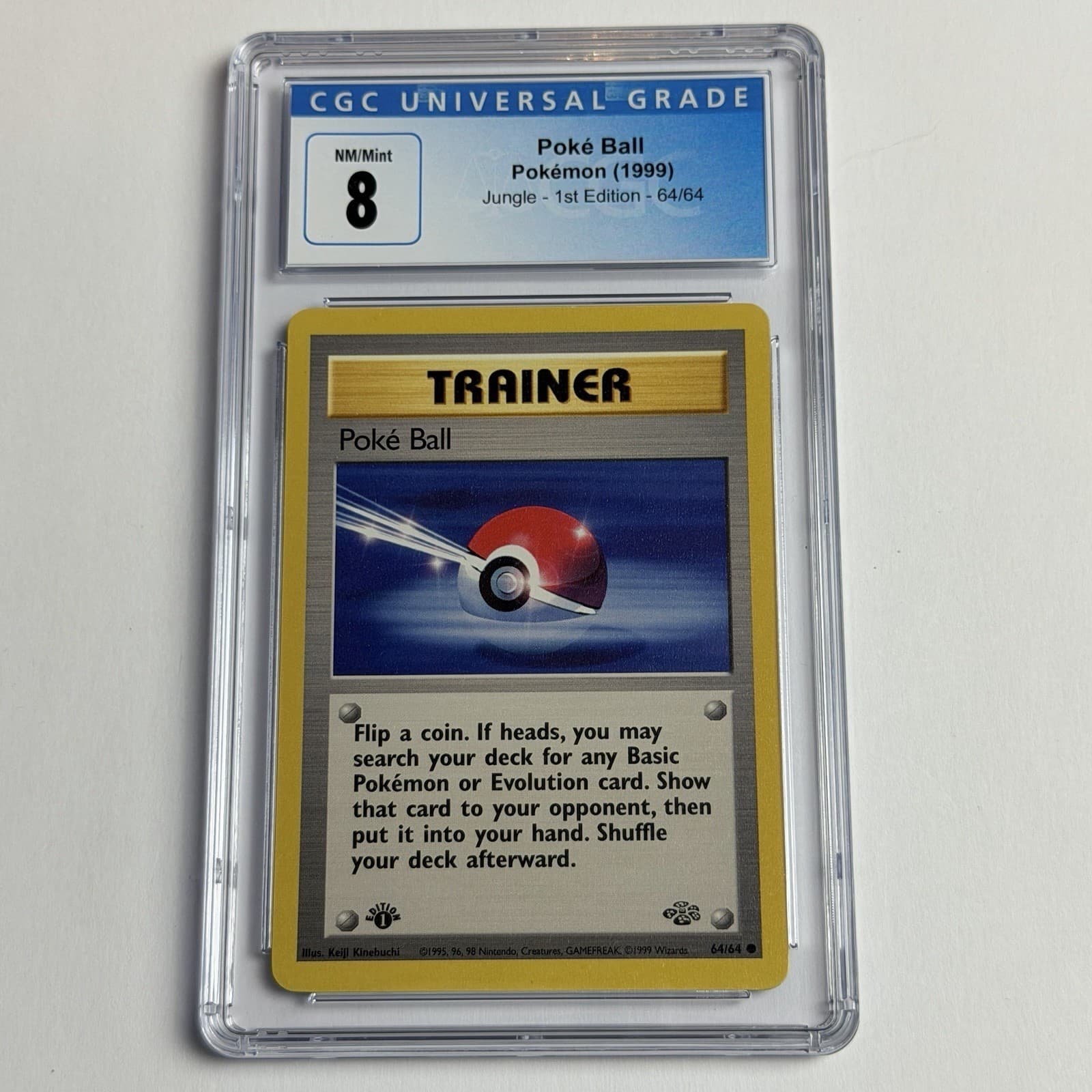 Poke Ball 64/64 Jungle 1st Edition Trainer CGC 8 NM/Mint 1999 TCG Pokemon WotC