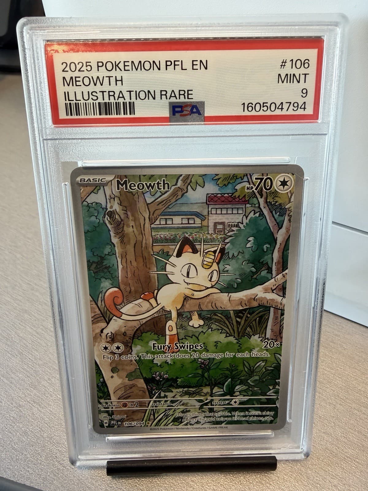 Meowth 106/094 Me02: Phantasmal Flames Holo PSA9
