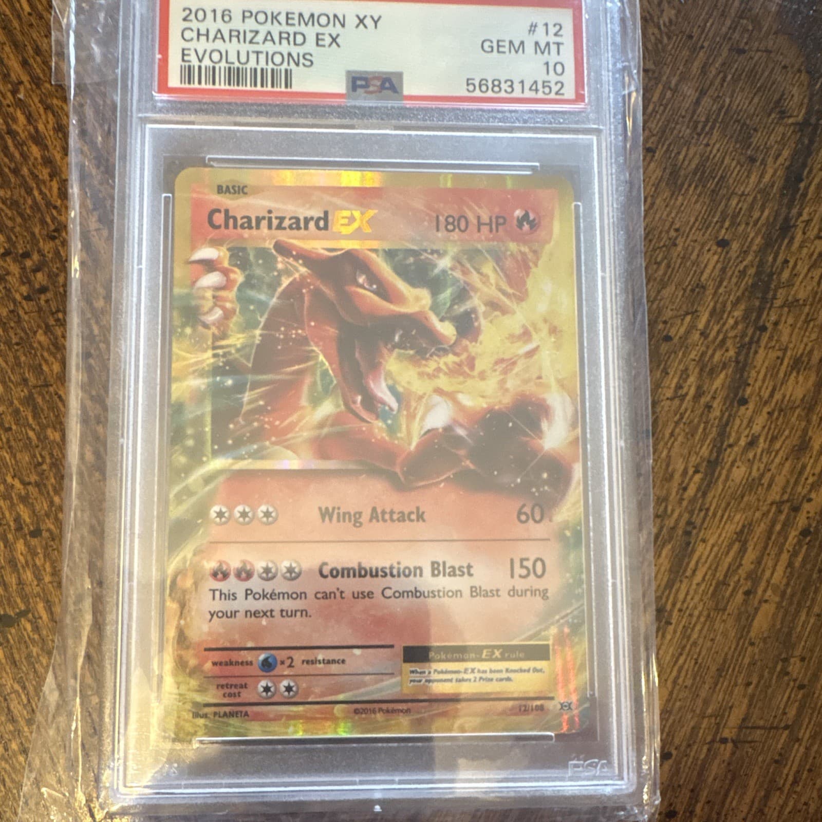 The Pokémon Company 2016 Charizard EX 12/108 Evolutions Holo ENG PSA 10