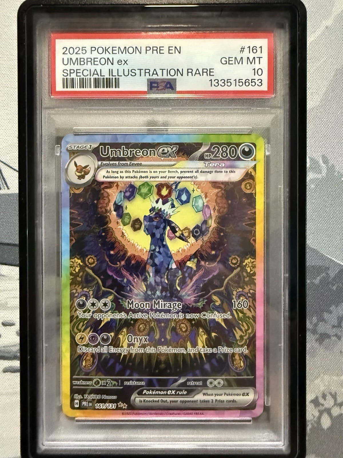 Pokémon TCG Prismatic Evolutions Umbreon EX Card 161/131 PSA 10