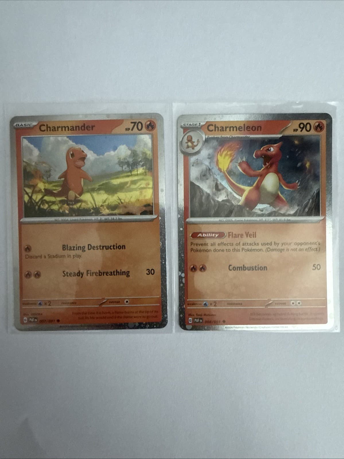 Pokemon TCG  Charmander #7 Charmeleon #8 Paldean Fates Cosmos Holo