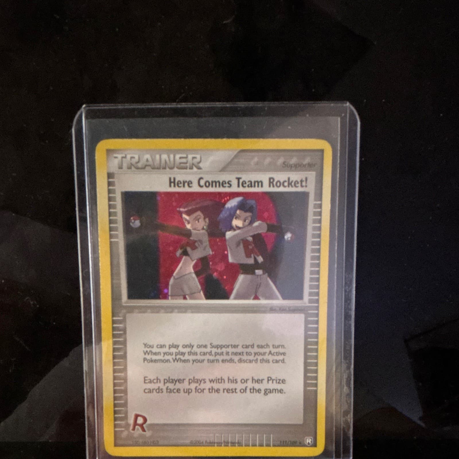 Nintendo Pokémon TCG Here Comes Team Rocket! 111/109 TR Returns Holo EN