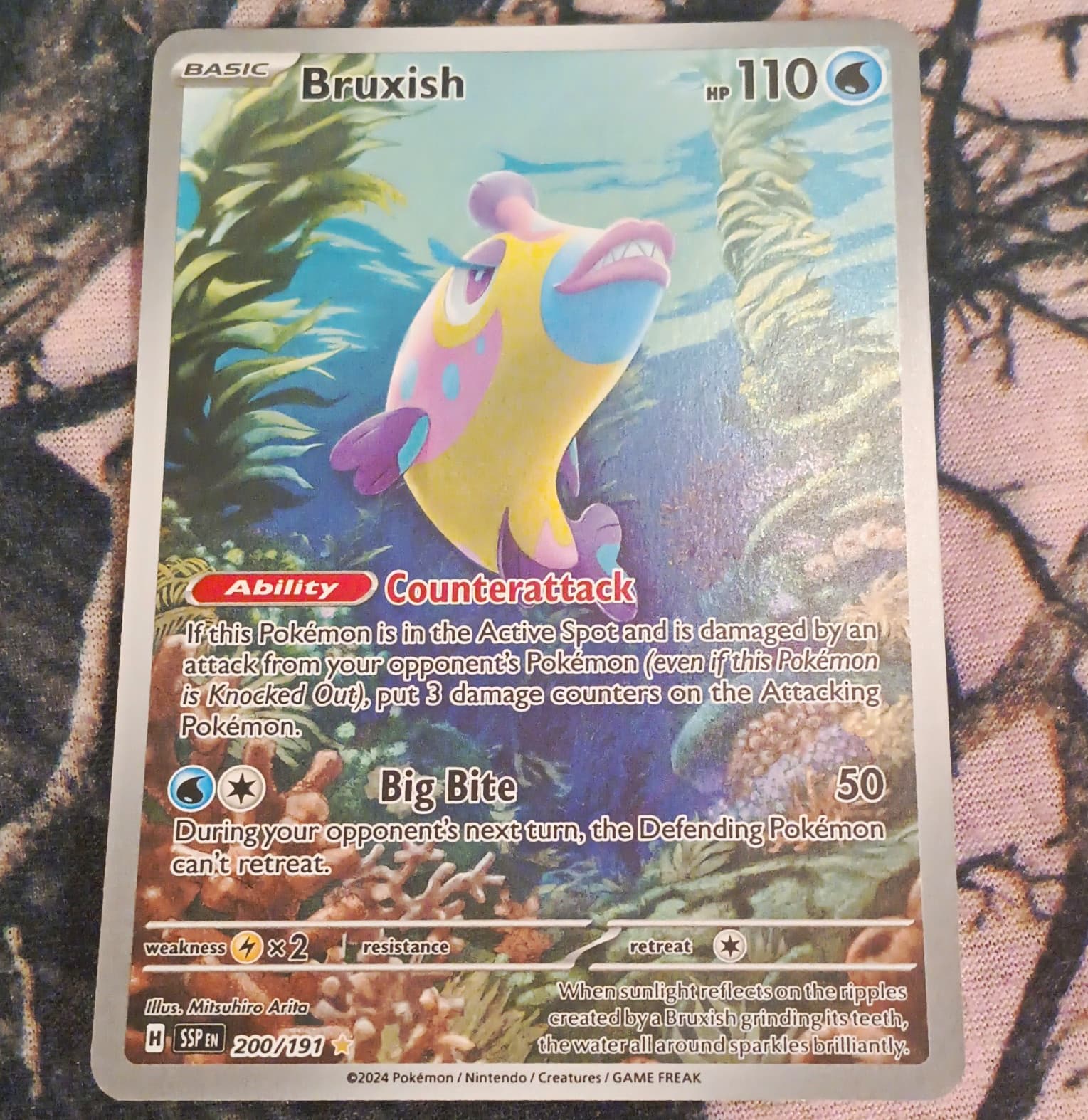 The Pokemon Company Pokemon TCG Bruxish 200/191 Surging Sparks IR Holo EN