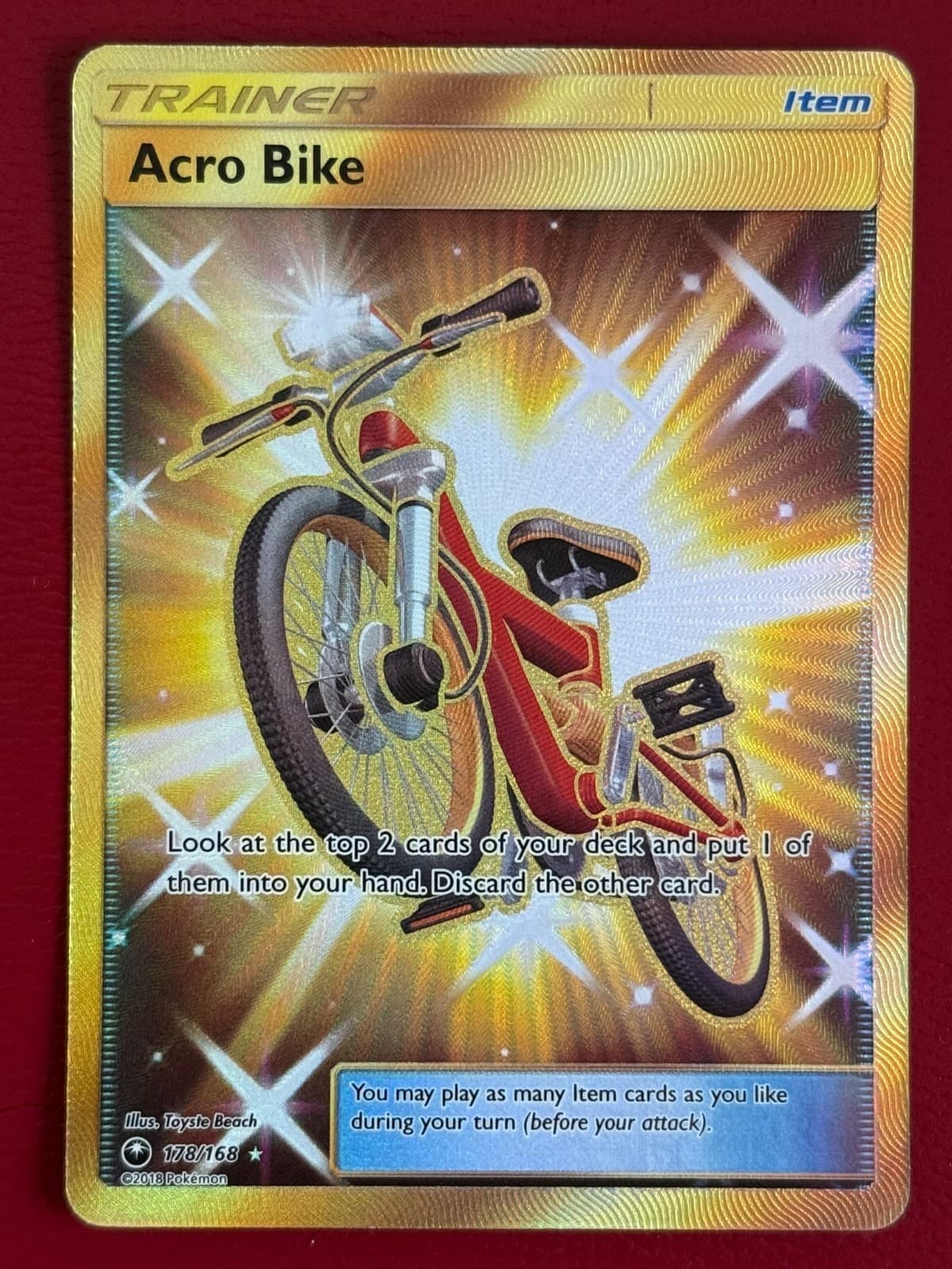 Pokémon TCG SM-Celestial Storm Acro Bike (Secret) Secret Rare Foil 178/168 (NM)