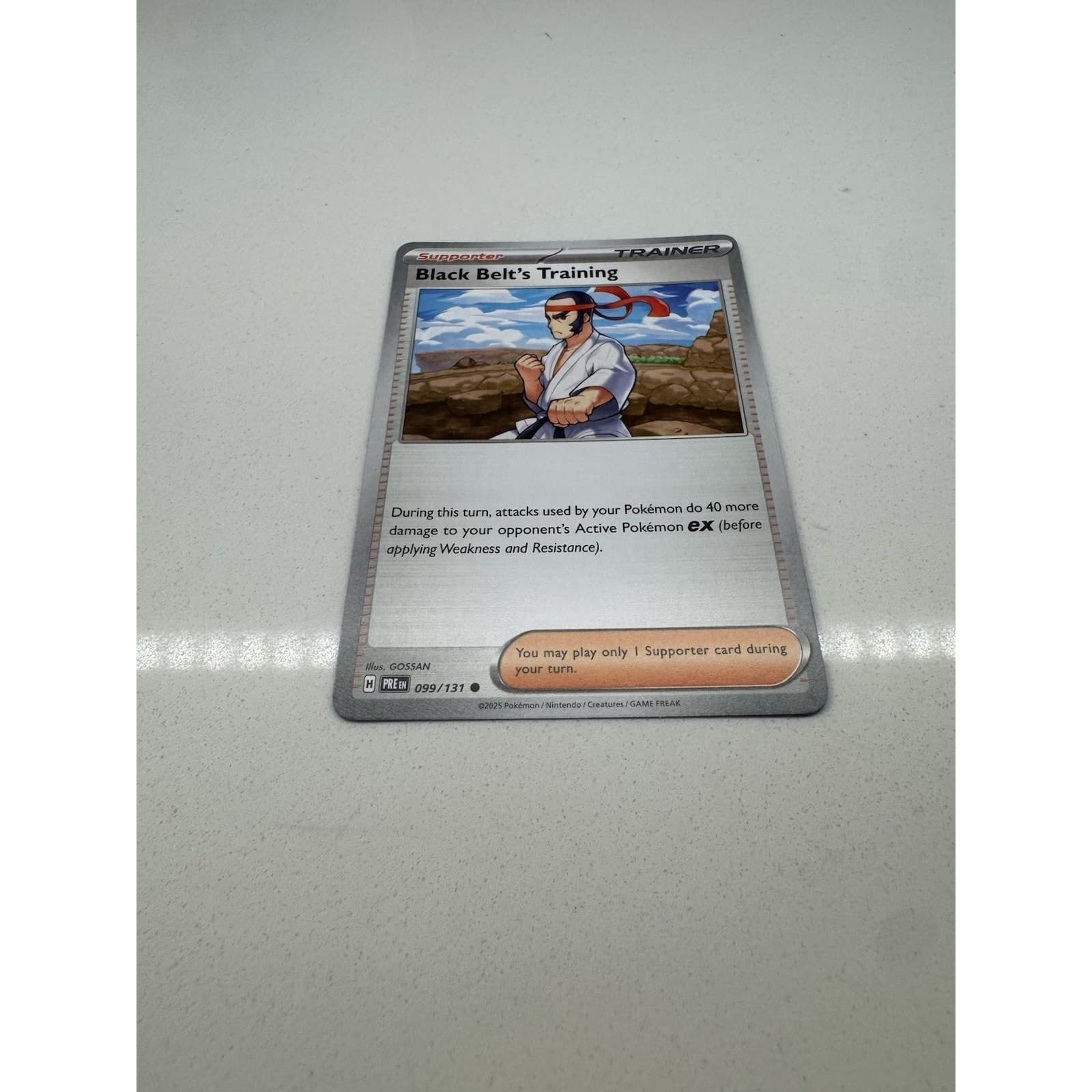 Pokémon TCG SV-Prismatic Evolutions Black Belt's Training #99/131 Regular Common