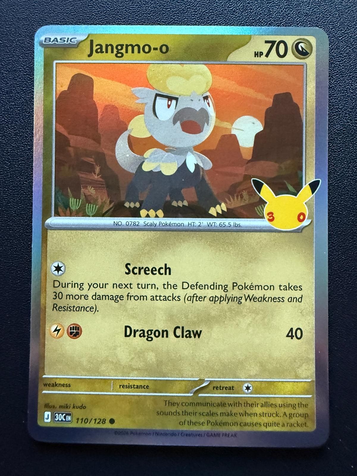 Jangmo-o 110/128 ME: 30th Celebration Pokemon Holo Near Mint
