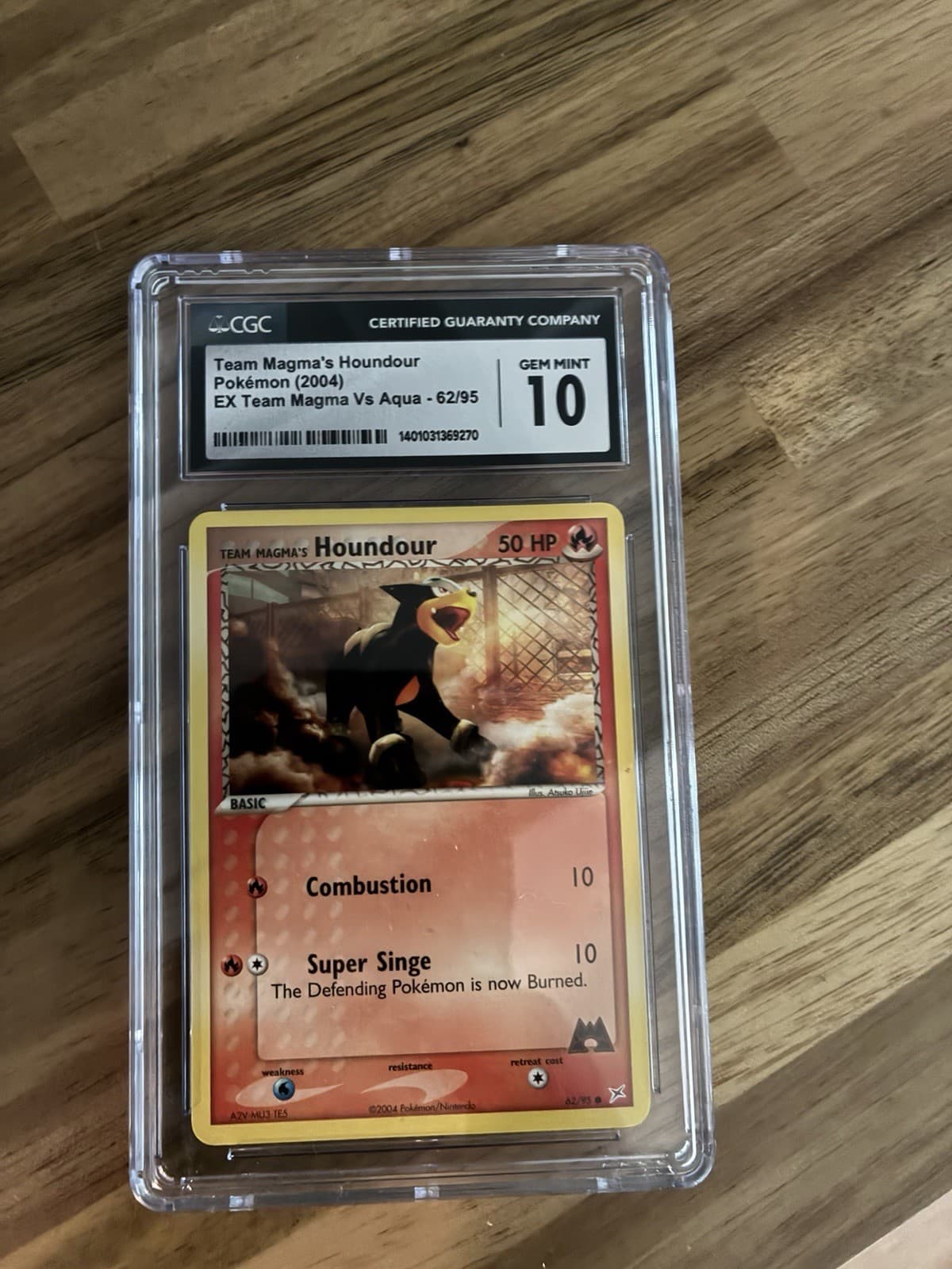 Team Magma's Houndour 62/95 CGC 10