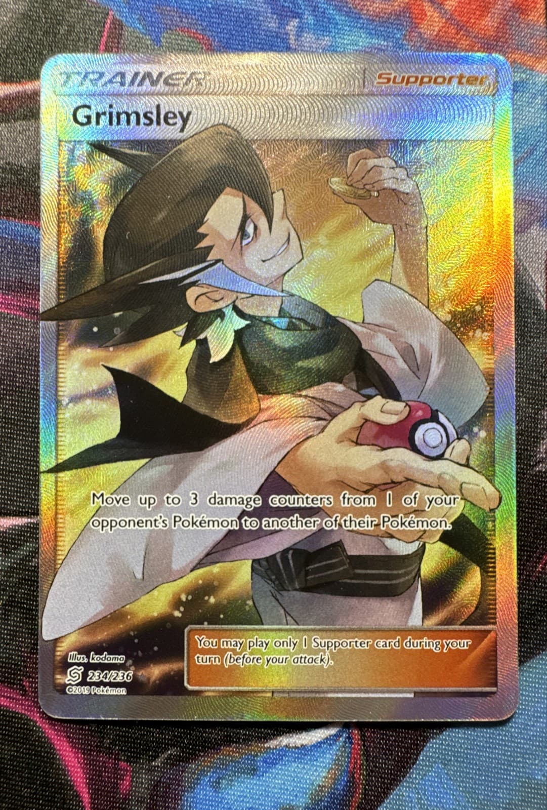 Grimsley (Full Art) 234/236 Sm-Unified Minds Holo