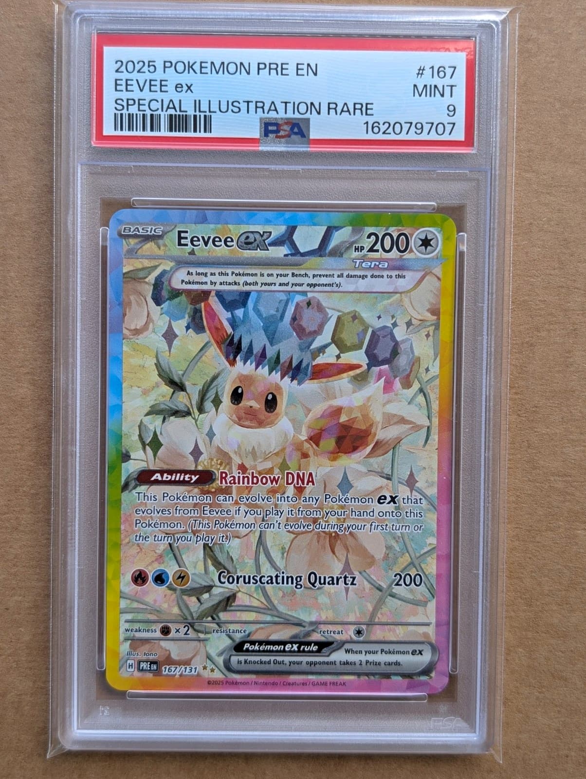 Eevee ex 167/131 Sv: Prismatic Evolutions PSA 9 SIR Holo English 2025