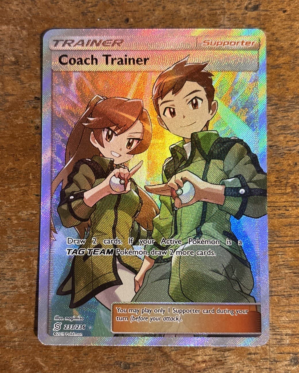 Coach Trainer 233/236 SM-Unified Minds Full Art Ultra Rare Holo English