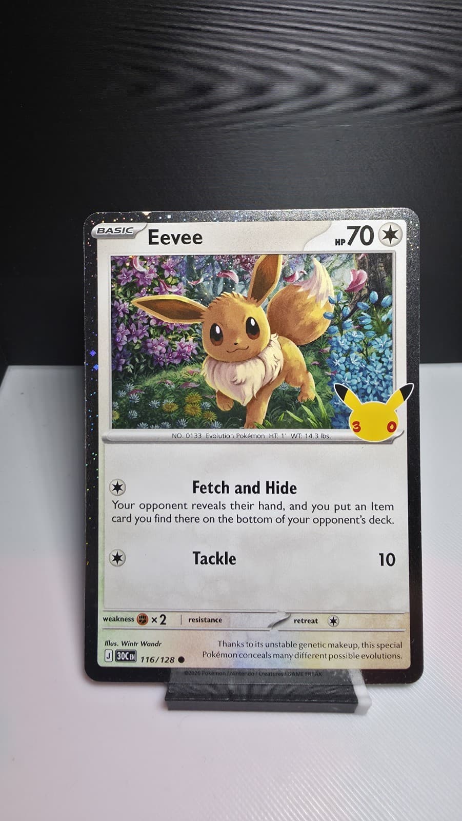 Eevee 116/128 Cosmo Holo Common ME: 30th Celebration Pokemon NM