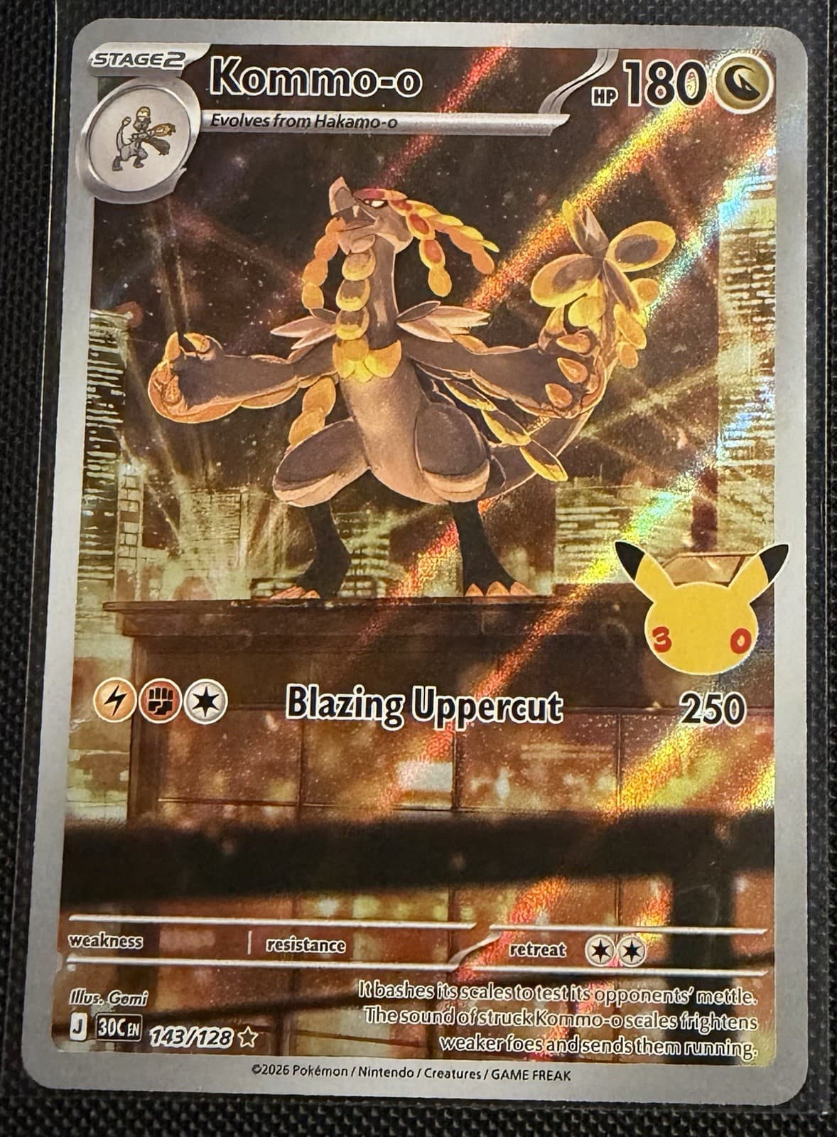 Pokemon TCG: 30th Celebration “Kommo-o” 143/128 Holo