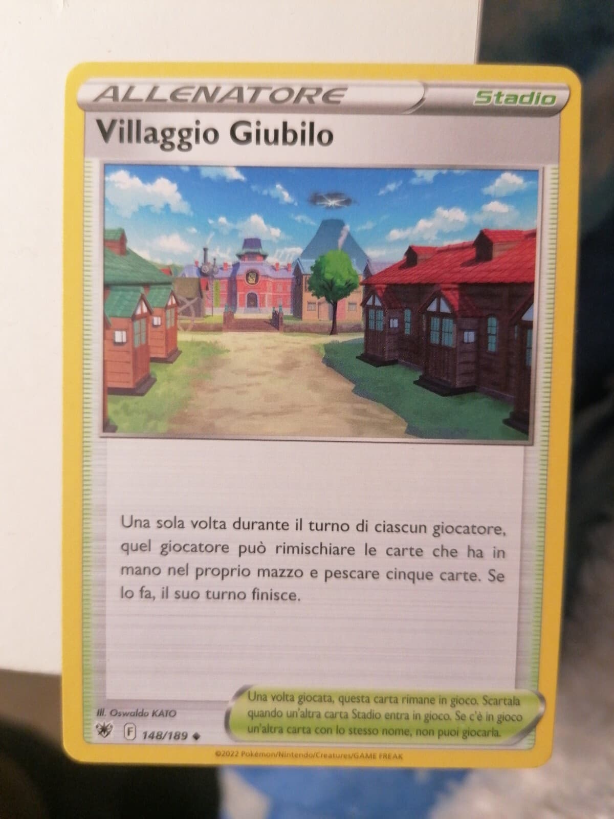 Carta Pokémon spada e scudo lucentezza siderale 148/189 villaggio giubilo nuova