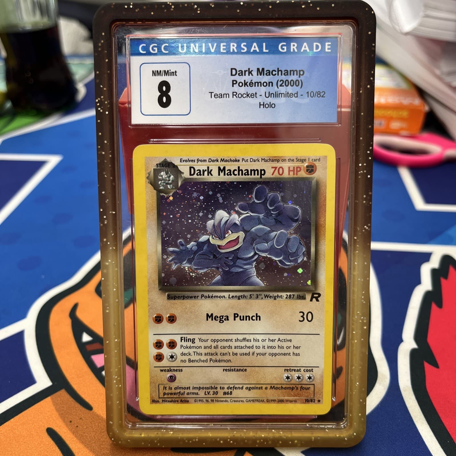 Dark Machamp 2000 Team Rocket #10/82 - CGC NM8
