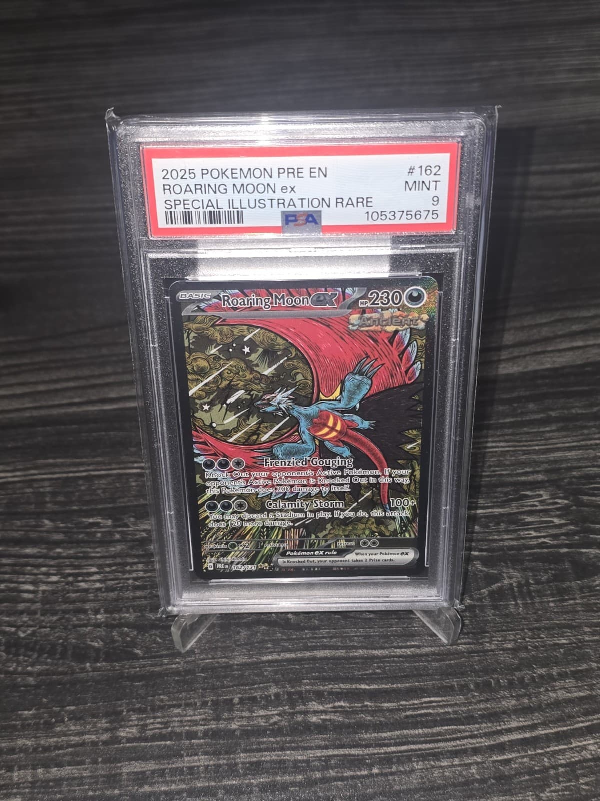 Pokemon Prismatic Evolutions Roaring Moon EX 162/131 SIR PSA 9