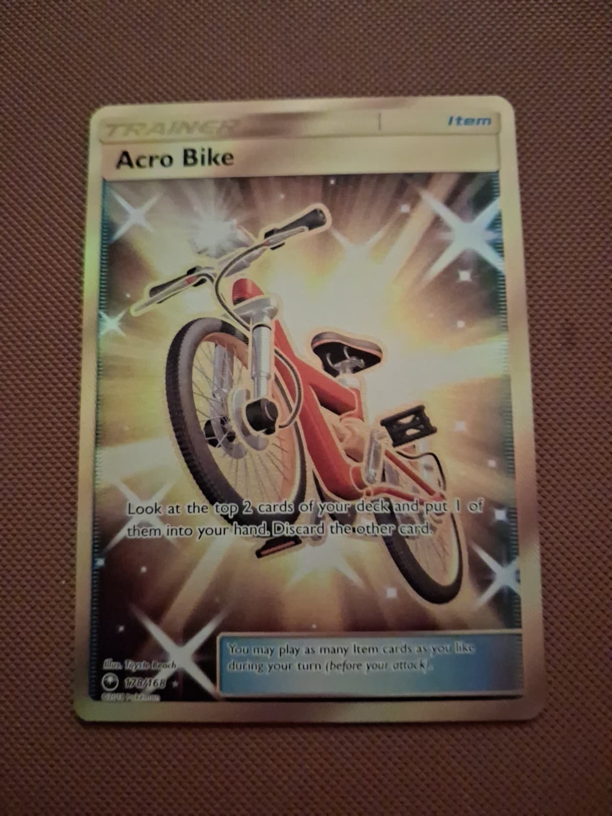 Acro Bike (Secret) 178/168 Sm-Celestial Storm Holo
