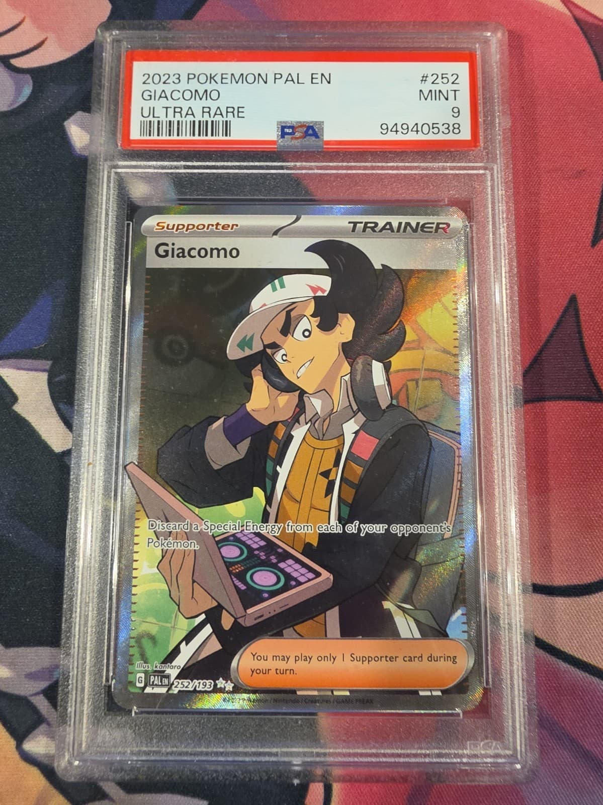 Giacomo 252/193 Paldea Evolved Full Art Trainer PSA 9