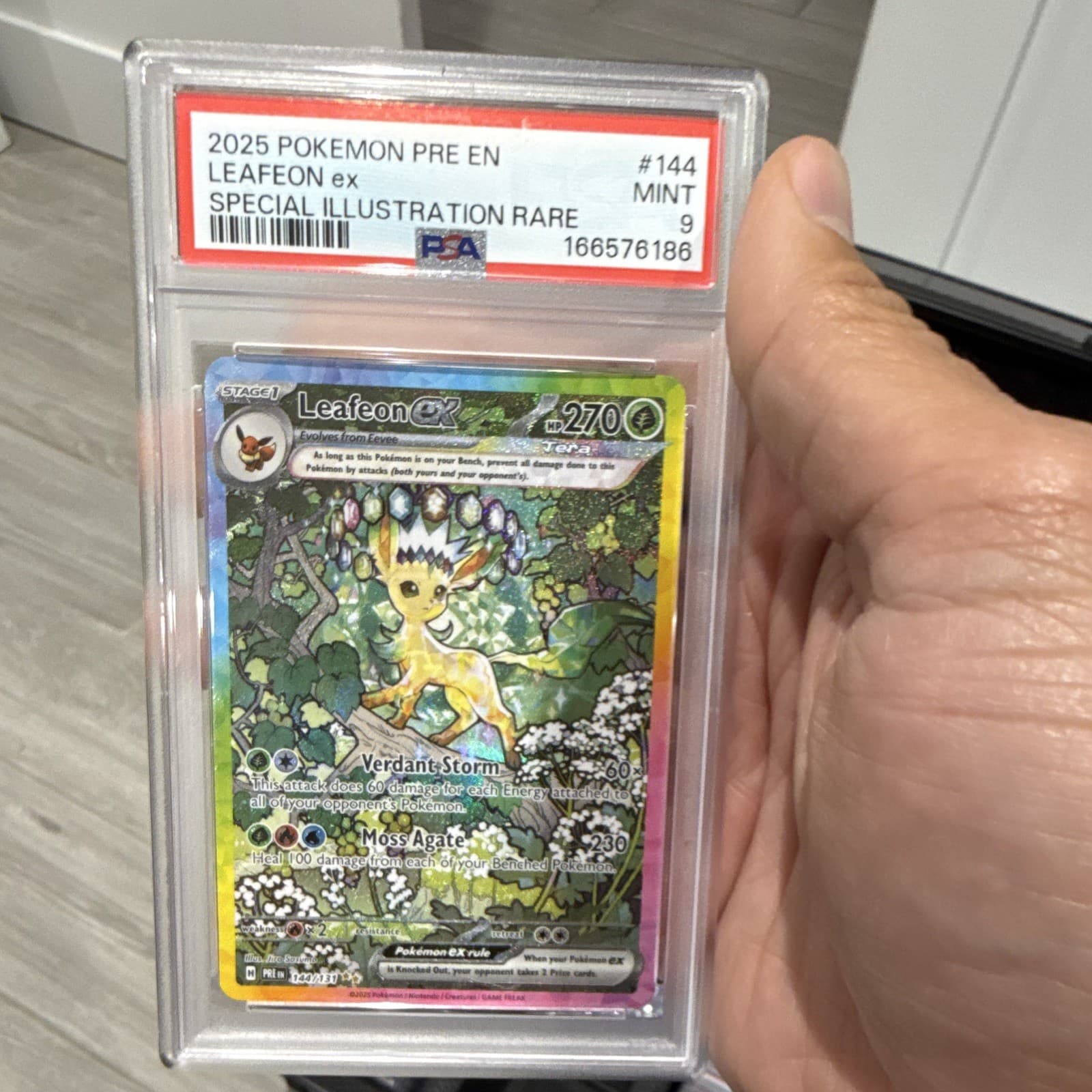 The Pokémon Company Leafeon ex 144/131 Prismatic Evolutions SIR Holo ENG PSA 9