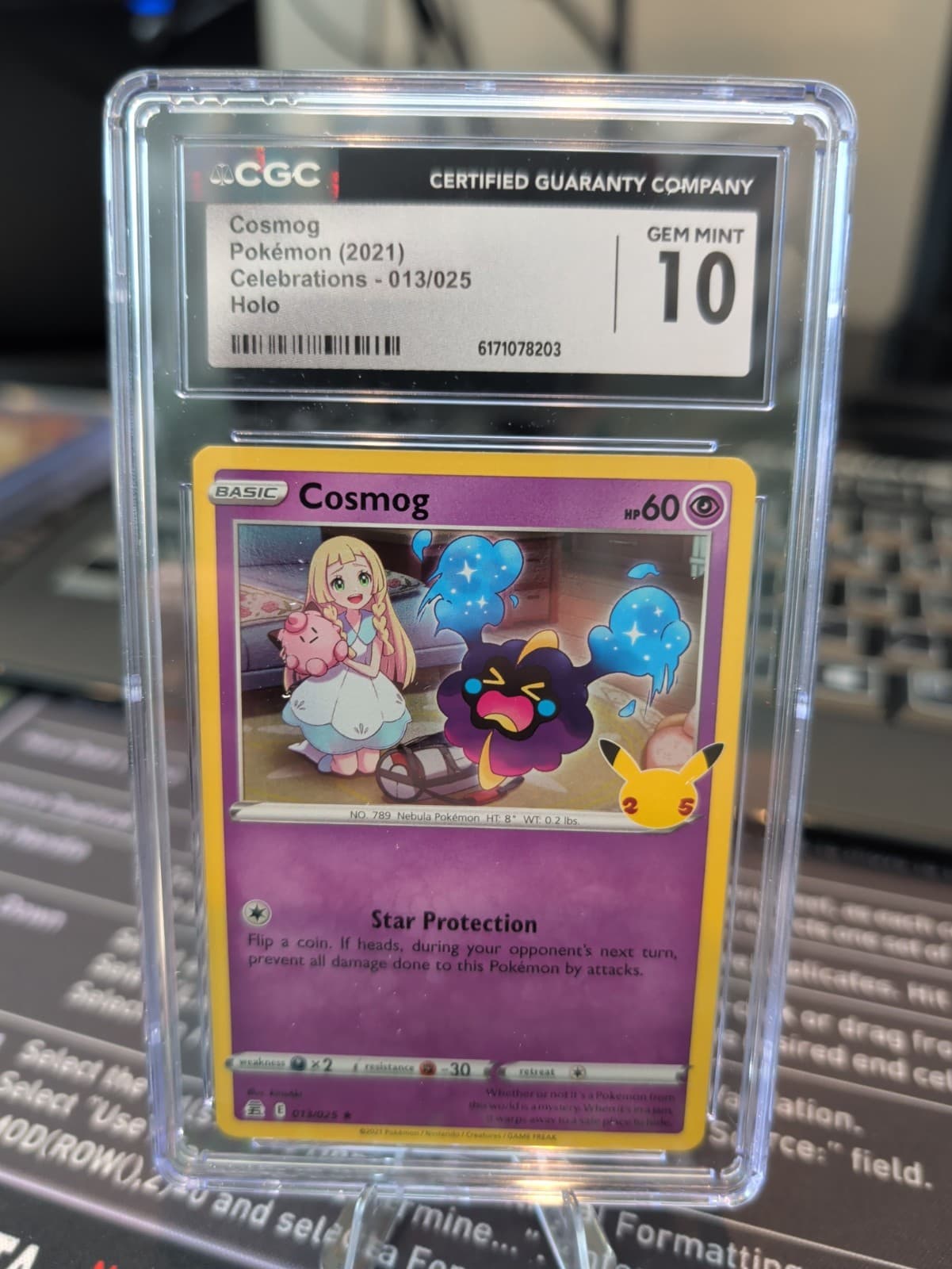 CGC 10 - Cosmog 013/025 Celebrations Holo