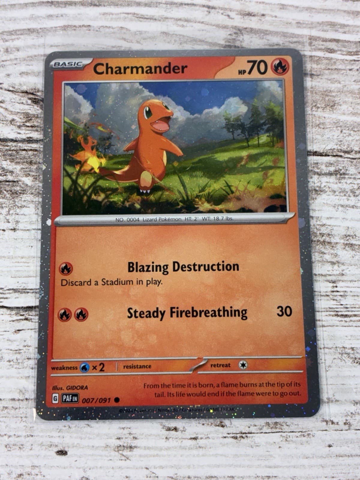Charmander Cosmos Holo #7 - Pokemon Paldean Fates - NM Near Mint
