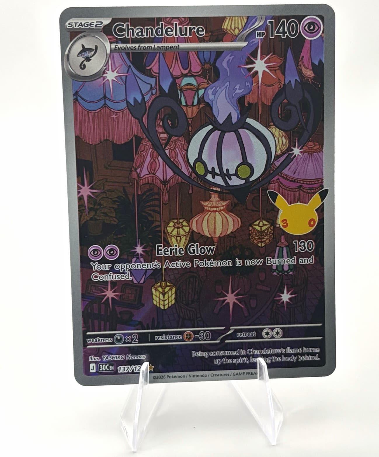 The Pokémon Company Chandelure 137/128 30th Celebration Illus Rare Holo