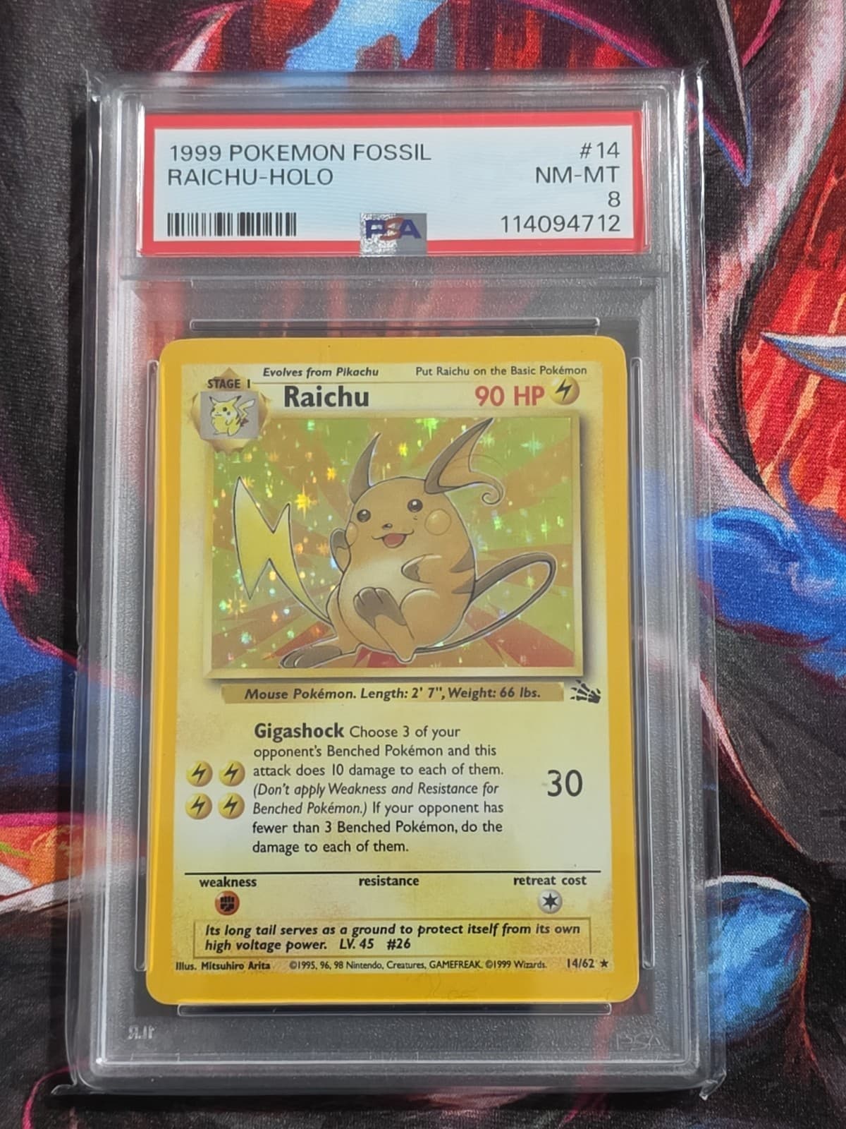 Raichu Holo #14 Pokemon Fossil 1999 PSA 8