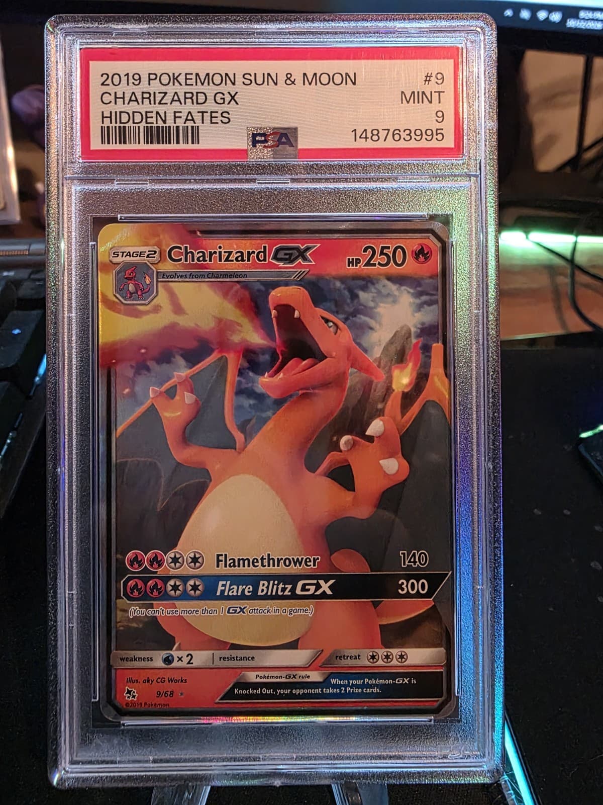 The Pokémon Company 2019 Hidden Fates Charizard GX 9/68 Holo PSA 9