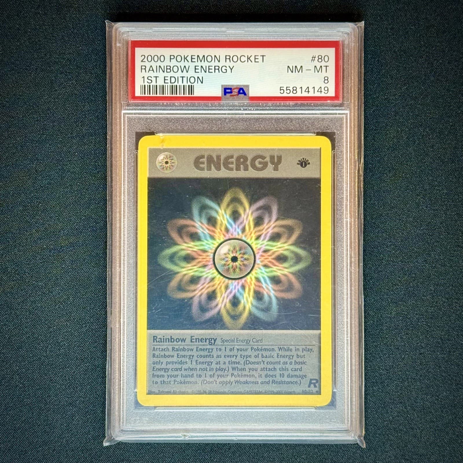 2000 Pokemon Team Rocket Rainbow Energy #80/82 1st Edition PSA 8 NM-MT WOTC