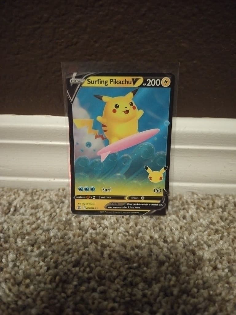 Surfing Pikachu V 8/25 NM Holo #8 Celebrations 25th Anniversary Pokemon Stamp
