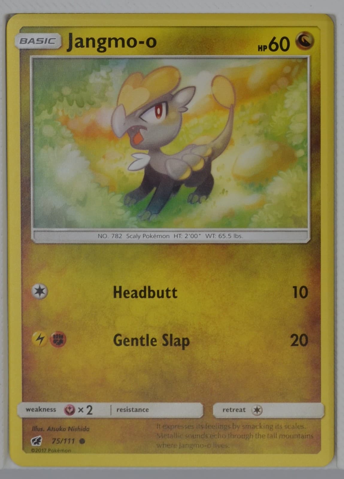 Jangmo-o 75/111 SM - Crimson Invasion Pokemon TCG
