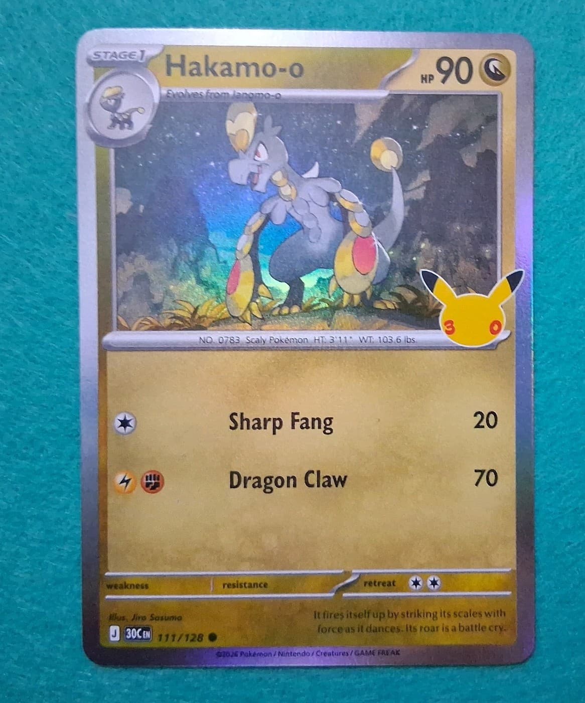 Hakamo-o 111/128 ME: 30th Celebration Pokemon Holo NM